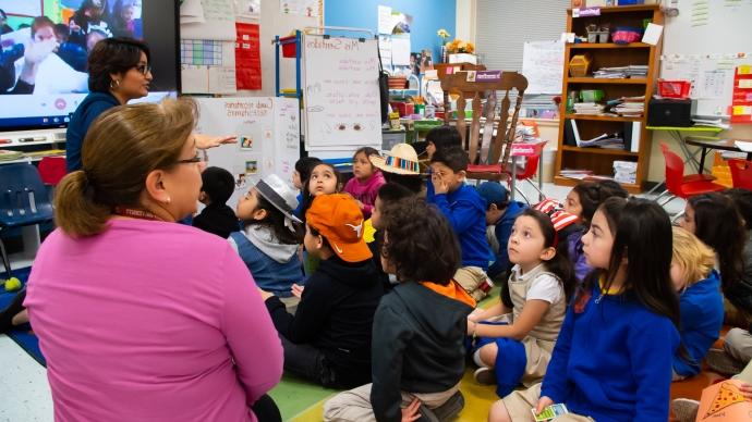 a Trinity education professors leads an elementary school classroom